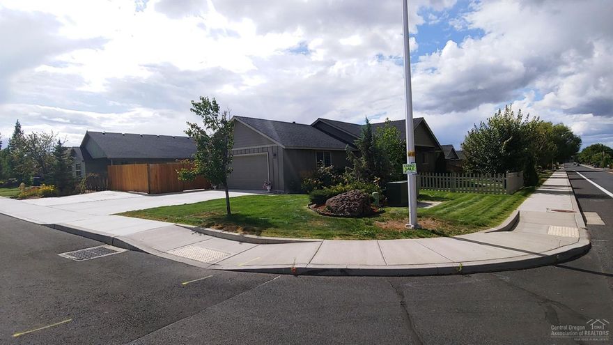 Location, location, location! This charming turn key, single level home is located on Redmond's desirable NW side in close proximity to highway & bypass access, shopping, medical facilities and hospital. It offers extensive parking in front & behind the fence and beautiful landscaping on a corner lot. The interior offers laminate wood, tile and upgraded carpet, knotty alder cabinets, a sink in the utility room, a finished garage and much more. This beauty won't last long, come take a look!