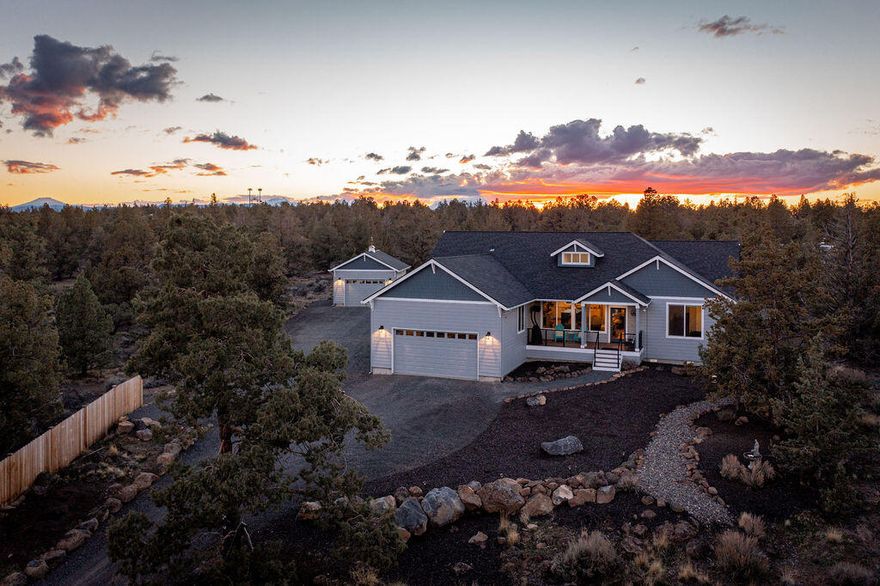 Beautiful, like new, custom built home with sweeping views of the Ochocos! Situated between Bend, Tumalo and Redmond at the top of Whispering Pines and backing to 125 acres of BLM. This modern, single level beauty has so many incredible features: 3+ acres, trex decking, RV hookups and dump, extra, fully insulated and heated garage with workbench, open great room with island & electric fireplace, gorgeous landscaping with meandering trails and loads of privacy! You will love the custom bar hidden behind a beautiful barn door, live edge wood mantle, XL barn door pantry, hickory floors, quartz counters, high ceilings, large bedrooms, huge windows and sumptuous primary suite! Very lightly lived in since being built in 2019. Watch the sunrise with your morning coffee and enjoy evenings on the back covered patio! Quick and easy to stores, shops, eateries yet ultimate privacy once you are home. 
Please see attached list for all the amazing features + video tour and 3D virtual walk through.
