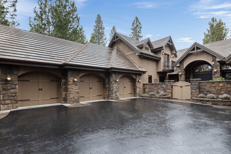 Experience luxury in this stunning estate, nestled on a private ½-acre lot along the 12th fairway. Blending Northwest Mountain Home charm with European elegance, the gated courtyard leads to a grand entrance revealing breathtaking golf course views. The open floor plan connects the spacious living room to expansive outdoor terraces, ideal for relaxation and entertaining. The gourmet kitchen features a Viking cook top, double ovens, warming drawer, prep island, and breakfast bar, flowing into the perfect entertaining area with a full bar and 400-bottle wine room. With privacy, picturesque views, and seamless indoor-outdoor living, this rare Broken Top gem is a must-see. Schedule your private showing today!