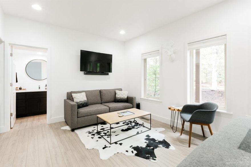 Freshly updated townhome in perfect Westside location with highly sought-after short term rental allowance and 2 separate lock-off units! This 2 BR/2BA in the Courtyard Townhomes at Broken Top has many modern design elements featuring new SS kitchen suite, Nest thermostats, gas fireplace, + upstairs master suite with great natural light and private balcony. The sunny downstairs has fresh paint throughout, beautiful quartz counters, modern hardware, SS fridge, + more! Best of all the home lends itself to multiple owner/investment opportunities with both long and short term rental options, is in the only section of Broken Top that allows for vacation rentals, plus all exterior maintenance is covered by HOA. Excellent location steps out your front door to Old Mill, Mt. Bachelor, OSU/COCC, Phil's Trail, Deschutes River, breweries, restaurants, parks, you name it, all the while located in Broken Top a beautiful gated community with paved trails and stunning views throughout--Don't miss out!