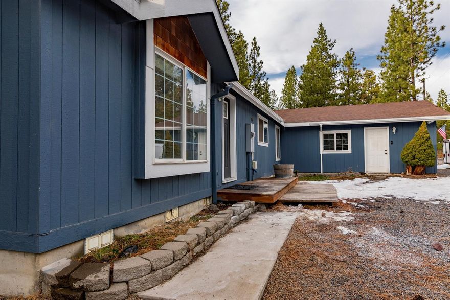 Spacious family home with views situated on just over a 1/2 acre backing to the canal in DRW- this home has it all! Open & bright this home features a 1000 square feet of terraced decking, canal views in the summer, living and family rooms, skylights in the kitchen, 3 bedrooms plus an office, double car garage and plenty of storage space inside and out. Well cared for, recent updates include freshly painted interior and exterior, newly updated flooring, and recently serviced fuel efficient pellet stove.