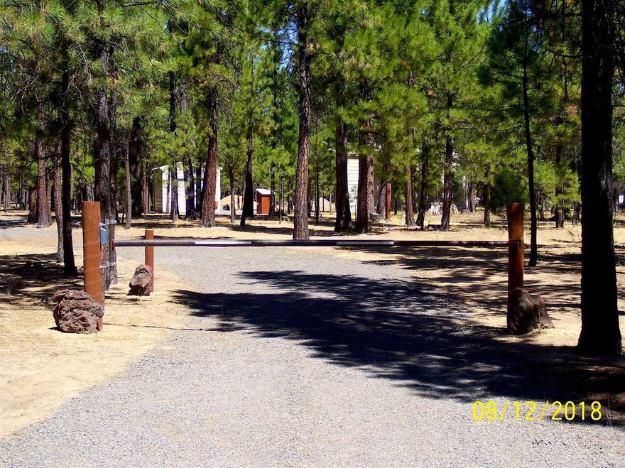 This beautiful 1.79 acre lot is ready for you to build your dream home or vacation home. Property has community water, 400 amp power, a 24'x 40' RV parking/storage building, a 12'x 20' storage building with a hot water heater, and the septic feasibility has been completed. This community is a short distance from all of the many recreational activities Central Oregon has to offer. This quiet, very desirable neighborhood does allow you to live in your RV part time.