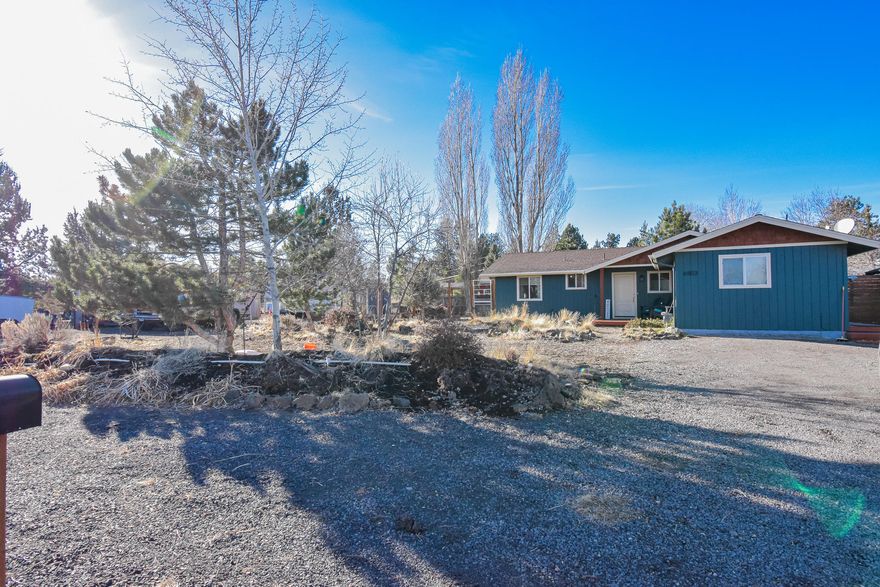 Almost a half acre in Bend, a rare find in todays market. You will love this home located in Bend's south east side. Quick and easy access to Reed market, shopping and hospitals. Set in a quite little cul-de-sac with plenty of room for all your toys and hobbies this charming single level home offers many beautiful updates. Recently remolded kitchen and bathrooms. The kitchen features Quartz countertops, custom cabinetry, stainless steel whirlpool appliances and a beautiful farm style sink. Bathrooms feature a large soaking tube and new vanities with quartz countertops. The garage was converted to offer more living space by adding a bathroom and an added bedroom. Ductless heating and cooling recently added as well.   Lots of storage and sheds for hobbies. Large area for gardening and you could even add a shop! Lots of possibilities with this home and property. Don't miss out on this home! Showings Saturday 01/23/2021 1 PM to 5 PM only.