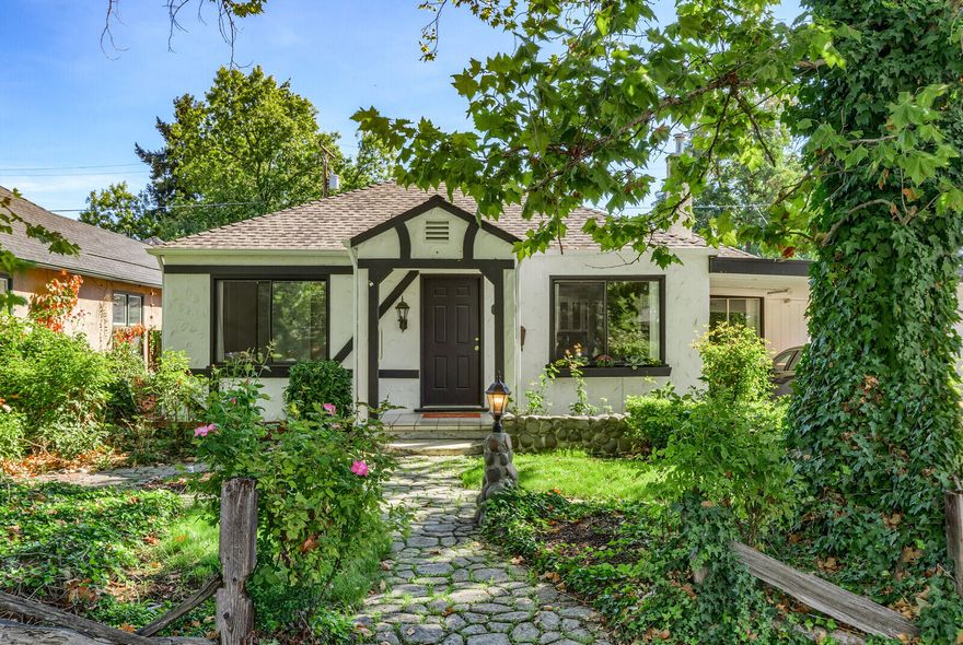 Hard to find remodeled home in East Medford. This amazing 3 bedroom home has new floors, new roof, new paint, new hot water heater, and tons of character. The moment you pull up to your new home, the cobblestone walkway invites you in and you feel as if you're walking into a fairytale story. You enter the front door and you are treated with a large living room and french doors leading into the kitchen where you'll find stainless steal appliances. The wood-grained floors are beautiful! The back yard is spacious and the property is zoned to allow an ADU. Homes like this don't come on the market everyday and most are gone before you even get to see them. Come claim your new home today.