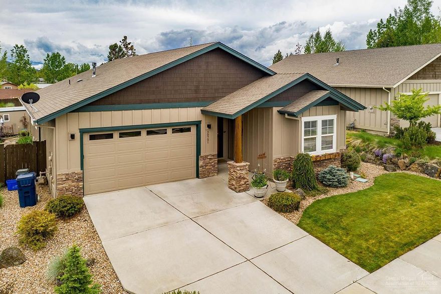 A pleasure to show. Elegant 1-level, Great room plan w/ vaulted ceilings, gas/wood fireplace, gorgeous wood flooring throughout. Kitchen w/bar seating, informal dining, roll out drawers/cabinets. Spacious master suite has soaking tub/separate shower, dual sinks & is separated from 2 other bedrooms. Sliding door opens to gazebo/hot tub. Surround sound in & out. Maximum private fenced back yard w Pergola covered patio, enclosed gazebo w/hot tub. Natural beauty w/rock garden for low maintenance. Storage shed for gardening tools. Very calm peaceful home with many windows for an abundance of light.