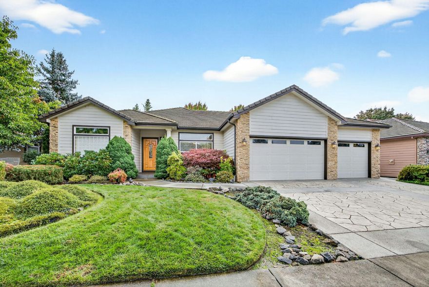 This lovely single-story home in a beautiful location at the Eagle Point Golf Course is ready for your viewing pleasure. The floor plan is excellent, featuring a separate formal dining area and a breakfast nook off the kitchen. The gourmet kitchen looks into the large family room with a gas fireplace. All bedrooms are oversized, and yes, the three-car garage!
Curb appeal is a 10+, and the rear yard is private, featuring a full-length covered patio and a little stream running behind, which is very relaxing.