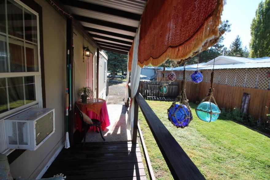 This home is Eco friendly tiny home. Concrete structural insulated panels make up the exterior of the home. Metal roof.  Perfect view of the golf course and pond. Completely fenced and a partial wrap around deck.  This tiny home is cute and cozy. There is a second room that could be a bedroom, but no closet.