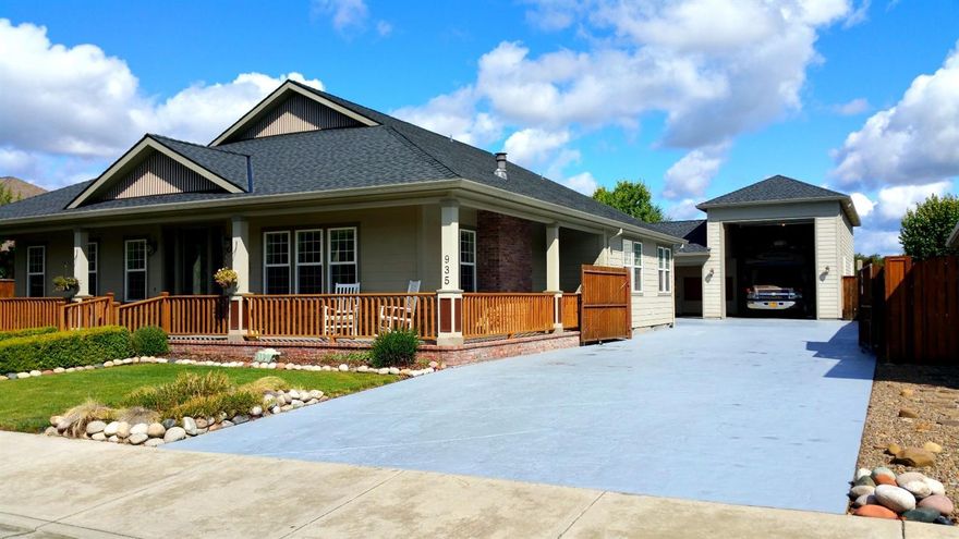 RV and lots of toys Enthusiast Dream Home! Beautiful Robert Trent Jones Golf Community in Eagle Point. You will find this beautiful Craftsman style 2500+ sft. Home and 1800+ sft. Garage with 42+ foot RV BARN! Imagine pulling thru the gated entrance to your RV Barn, Car and Toy paradise. Driveway is 7 stamped concrete. Full hook ups, 2 dump stations, telephone, cable, central vacuum and a utility sink. 3 - 220 outlets, workbench and shelves. Craftsman style home with curb appeal! Living w/columns and high coffered tray ceilings with accent lighting, Solid oak wood floors throughout most of the home. The office w/french doors, built in desk and hutch. The Entertainers dream Gourmet Kitchen with double ovens and 5 burner gas range will be a breeze to make fabulous meals. Master bath jetted tub, shower W/2 heads and double sinks! The backyard is private and you will enjoy sitting under the huge covered patio. 1 year home warranty!