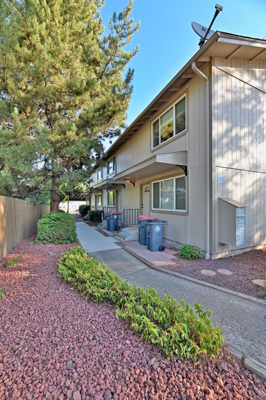 Great investment opportunity in Central Point! This well-maintained townhome-style 4-plex features four 2-bedroom, 1-bath units, each offering functional layouts and strong rental demand. Recent exterior paint, updated windows and doors, and various upgrades over the years add to its appeal. The roof is approximately 15 years old, and one unit is currently vacant—perfect for owner-occupant or easy showings. Each unit rents for $1,250/month, providing solid income with potential for future rent growth. There may be an opportunity to add a fifth unit—buyer to perform due diligence with the city. Conveniently located near shopping, schools, and freeway access, this property is ideal for investors looking to expand their portfolio with a low-maintenance, income-producing asset in a growing Southern Oregon market. Don't miss this value-add multifamily with potential upside in Central Point!