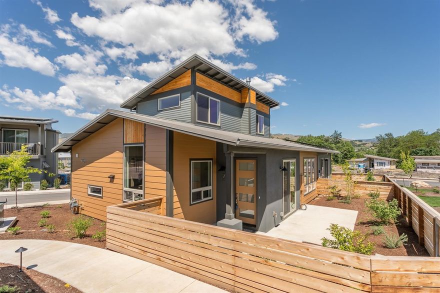 Ashland's Verde Village Planned Community! Perhaps the most energy efficient development in Oregon, these sustainably planned and constructed homes are designed to meet Net-Zero Ready, Earth Advantage Platinum standards. Utilizing active and passive solar design, renewable energy features, and thoughtful siting, the Verde Village Community is envisioned to reduce your carbon footprint and maximize an environmentally sound, Ashland lifestyle. Phase One offers 1, 2 and 3 bedroom designs in both single and two-level configurations, each with a variety of high quality, sustainable amenities - granite, hardwood, Energy Star appliances and low-VOC paints and adhesives - qualifying them for Oregon's High Performance Home Tax Credit. Extensive open space, Ashland Creek pathway, Bear Creek Greenway, community garden spaces and easy access to OSF, hiking/biking trails and Mt. Ashland skiing. Come see the future of Ashland in Verde Village Oregon's Green Lifestyle community!