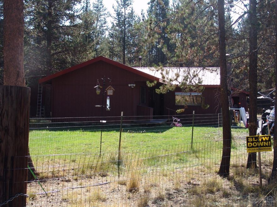 Cute Stick Built Home With Vintage Charm! Property is on a Paved Road with a Paved Driveway! 1 Bed 1 Bath 832 sq feet, that lives much larger! Custom Brick Fireplace for those cozy nights... Home sits on 1.16 Acres + or - Close to Town, Shopping and Amenities!! Home also Boasts an Open Floor Plan, with a well maintained home and lot! Really a Must See!