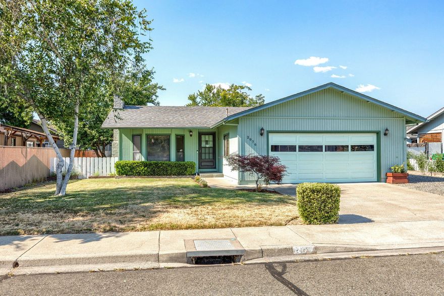 Sweet spacious home features 3 bedroom, 2 bath home with 1476 sf.  Cozy step -down living room with bay window and gas fireplace.  The cook will love the kitchen with an abundance of cabinets and counter space, 2 pantries, large dining area for all your guests.  En-suite bedroom is sunny and bright with ceiling fan and French Doors to the deck. You will fall in love with the Beautiful yard and garden area; all the works been done. Entertain family and friends on the decks and sitting areas.   An attached garage is 580 sf.  Detached SHOP is 400 Sf. Great area to get your walk in and enjoy the surrounding mountain views.  Convenient location; close to shopping, schools and hospital. Community well system at $35.00 a month. Put this one on your list to show.