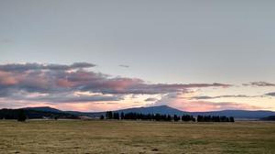 Sycan River Ranch. A very private secluded river front ranch of over 2000 acres with 5 artesian wells, nearly 1000 acres irrigated in excellent hay and pasture. Newer hay barns, indoor arena, corrals and state of the art livestock working facilities. Two homes, big shop, horse barn with round pen. Huge open meadows and timbered hillsides down to the water's edge. Good fishing, deer and water fowl hunting.