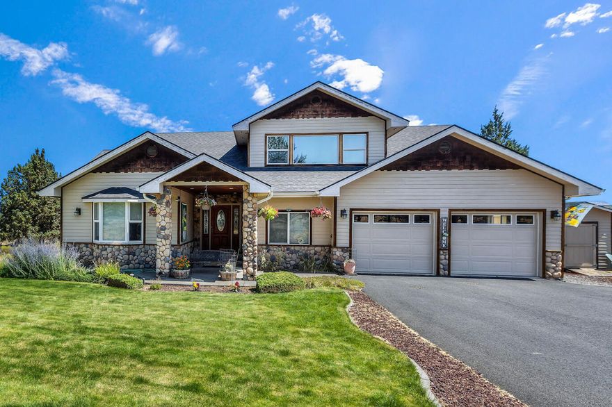 Enjoy the breathtaking views from this custom home perched on the upper rim of Crooked River Gorge.  The 2-story bank of windows frame ''The Ranch's'' original Ranch House, the stunning cliffs and panoramic views.  The well laid out kitchen features granite tile work, double ovens and custom cabinetry.  Relax in the Living Room with its propane stone fireplace and craftsman vaulted ceiling.  All 3 bedrooms are on the ground floor with the primary bedroom having private access to the wrap-around deck and hot tub.  Enjoy the cheerful primary bathroom with its hand painted double sinks and glass brick shower stall.  The upstairs loft is a large bonus room with its own full bathroom and private office and also highlights the beautiful view through the bank of windows.  The 2-car garage includes a workshop area.   Freshly painted exterior,  new roof, and the heat pump is only 2 years old. Come hang your hat in the resort community of Crooked River Ranch.