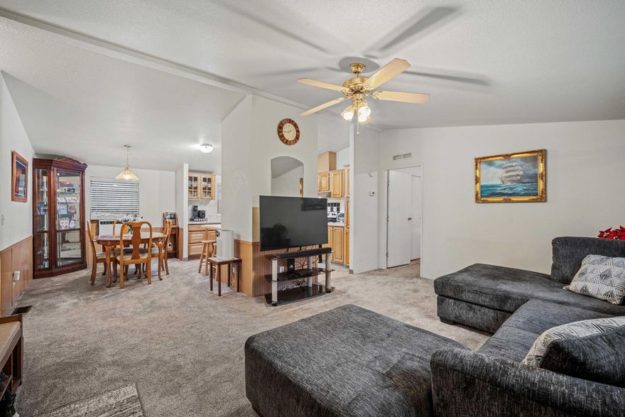 This affordable  3 bedroom and 2 bath,1188 SQFT manufactured home built in 2000 is ideally located in Oregon Water Wonderland, offering easy access to area lakes, Sunriver, and Mt. Bachelor. Situated on a spacious .47-acre lot with front and rear access, providing excellent potential for a shop or garage. Recent updates include new carpet and vinyl flooring, and a new water heater. Suitable as a primary residence, second home, or investment property. The backyard features three storage sheds (12x8, 12x10, and 6.5x10) and ample space for RV parking and recreational toys. Enjoy access to the OWW community boat ramp on the Big Deschutes River. Community water and sewer included.