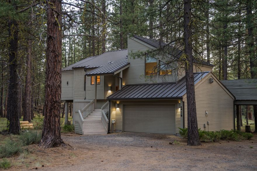 Brimming with character and nestled among the pines, this inviting Black Butte home is a chance to slow down, unplug, and make lasting memories. The reverse-living layout pairs an eclectic mix of charm and warmth with light-filled upper living spaces, vaulted ceilings, and a cozy wood stove—perfect for gathering around the table or stretching out on the deck. Downstairs offers flexible sleeping areas ideal for guests or family, making it perfect for second-home living or weekend getaways. Set on a quiet half-acre lot, you're close to the South Meadow pool and tennis courts, and just a bike ride from the Lakeside pool, activity center, and Lodge.
Whether for summer escapes or holiday gatherings, this is a place to come home to—again and again.