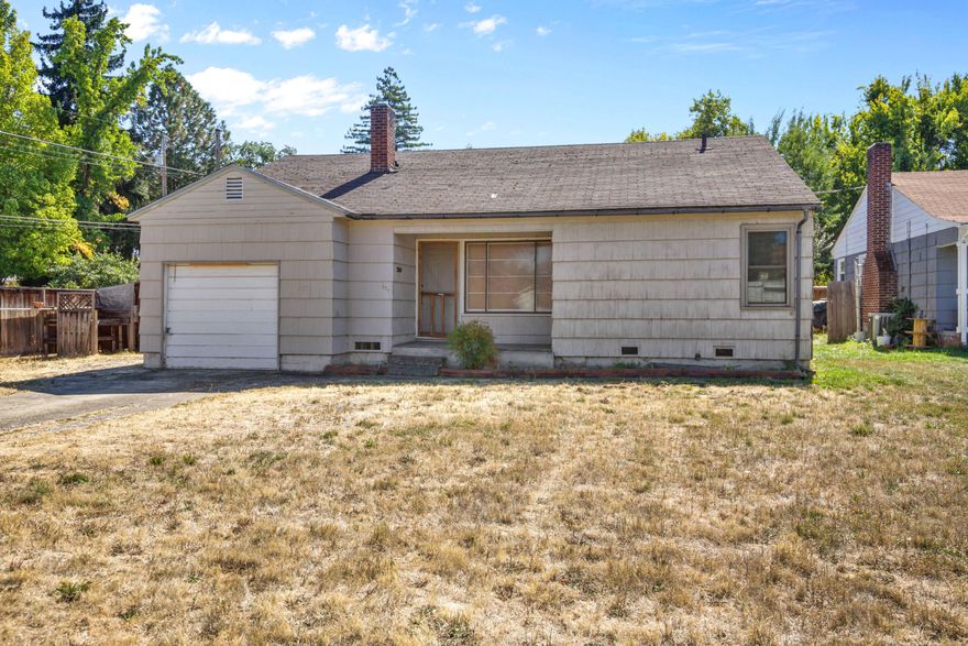 Investor or DIY enthusiast dream! This 1,402 sq/ft home in the heart of West Medford is brimming with potential. Featuring 3 bedrooms and 1 bathroom, this property is a blank canvas ready for your vision. Situated on a desirable corner lot, there's ample outdoor space for gardening, a patio, or a future expansion.

The spacious layout provides a great foundation for a modern remodel. The living areas are bright, and the bedrooms offer a solid starting point. The kitchen and bathroom are ready for a full renovation, allowing you to design them exactly to your taste.

This home is perfect for those who want to build sweat equity and create a personalized living space. Located in a established neighborhood, you'll be close to local amenities, schools, and parks. Don't miss this opportunity to transform this house into your dream home.
