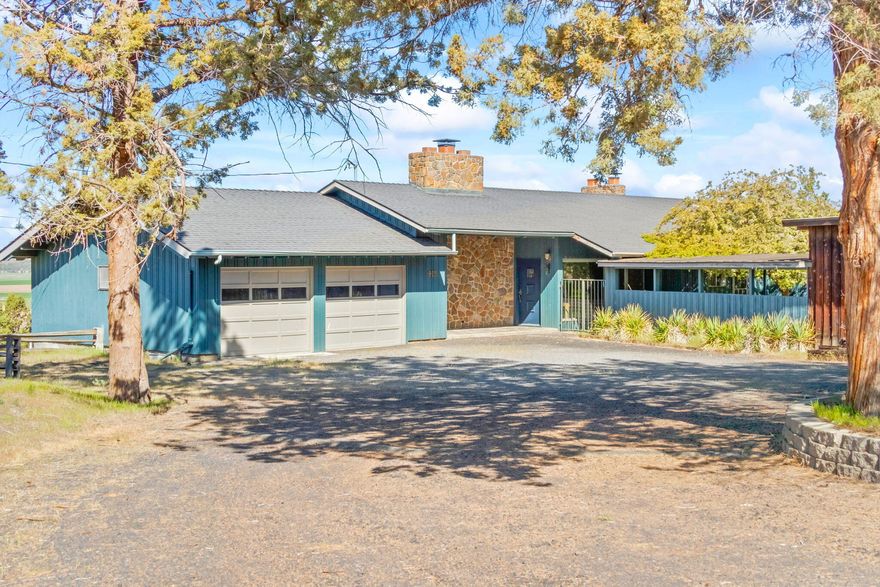 Sale failed due to Buyer being unable to perform. Motivated Sellers! This home was built by the original developer of Sunset Hills. Sitting on over 2.5 ac., he chose a view like no other. Cascade Mountains are in full view w/ beautiful farm ground leading into Prineville. Lrg lot provides ample parking, room for the garage/workshop & tiered courtyard w/ so much potential. Built for entertaining. Expansive windows provide views from nearly every room. Decking is accessed from many areas. 3 beds, 2 full baths, large laundry w/ ample built ins. Slate entry opens to large living room & dining w/ inviting fireplace. Around the corner you will find the kitchen w/ small breakfast area & its own fireplace. Working from home could not be more convenient w/ a fantastic office w/ views, wet bar & you guessed it... it's own fireplace. Double car attached garage & shop for toys, or additional storage. Minutes to Ochoco Reservoir for fishing & the Prineville Golf Club is within view