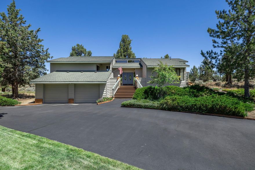 Located in the Boonesborough neighborhood & Priced To Sell! This 3 bedroom 3 full bath, 2381 sqft w/ attached 2 car garage as well as a shop! As you enter into the living room w/ tongue & groove wood accent vaulted ceilings, sider to the back deck & wood stove. To the right is the primary bedroom w/ granite countertops, double vanity, large walk-in closet, shower stall w/ dual shower heads, grip bars & a sliding glass door to a private deck w/ wheelchair access to the front of the house & shop. On the left is an elevated formal dining room that leads to a huge kitchen w/ breakfast bar, double oven, tons storage, pantry & room for an additional dining room. The additional bedroom is downstairs w/ a full bathroom & laundry w/ a sink. Outside is a large heated shop & a tri-level Trex deck for entertaining. Call for a showing today before it is gone!