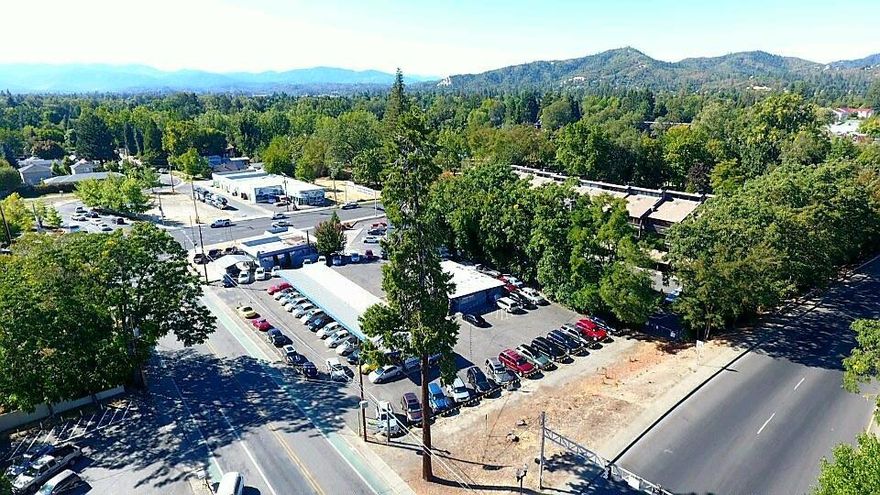 Established location across from Riverside Park and Riverside Park Vet Clinic on a busy intersection. Lots of parking on this .77 acre with lots of 7th Street and Park Street exposure. Also available by the same owner is the .23 acre lot next door (MLS #2969740). Don't miss out on an established location in Grants Pass with lots of exposure. All information deemed accurate but not guaranteed and subject to change at any time.