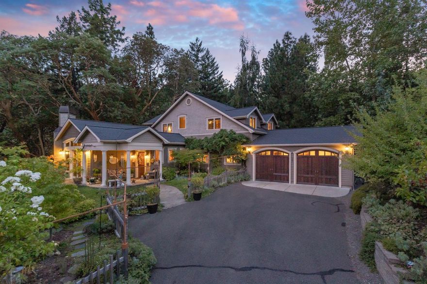 Highly desirable location provides the best of both country and city life in this wonderfully serene 5-acre property, located just minutes from downtown Ashland. Beautifully landscaped gardens, multiple outdoor entertainment spaces, peaceful mountain views and an abundance of natural scenery surround & enhance this gracious home. Inviting covered entry, vaulted ceiling, warming corner fireplace, and hardwood flooring highlight the spacious living area. Well-equipped kitchen that offers ample preparation and storage space, as well as high-quality amenities that include a 6-burner Wolfe range, baking center, granite counter tops, breakfast bar and a stunning glass sunroom dining space. Relaxing main level vaulted master suite w/separate shower, tub, & walk-in sauna. An office/den, laundry room & oversized double-car garage complete the main level. Second level offers 3 additional bedrooms and limestone bathroom. You'll want to call this delightful property home.