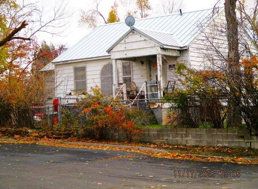 Work in progress, sold as-is, good concrete foundation and a metal roof.  There is a full basement with exterior door.  Updated electric panel.