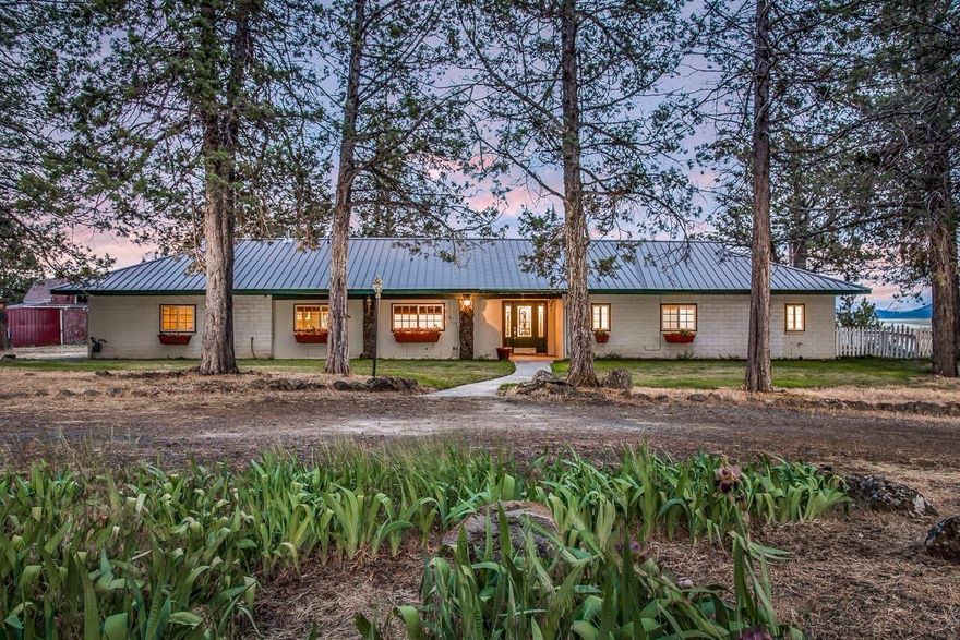 Single-level ranch-style home with 4 bedrooms, 2 bathrooms with wonderful panoramic views south over the Klamath River! Close to town but a very private setting at the end of a cul-de-sac. Long-lasting metal roof, low-maintenance brick home, and room for animals with a small barn (small pasture area). Newer Quaker-shaved wood flooring throughout the living room, hallway, and bedrooms. Tile flooring in the kitchen. Nice mud-room and additional storage area off of the garage. Certified wood stove. Double-pane vinyl windows throughout.