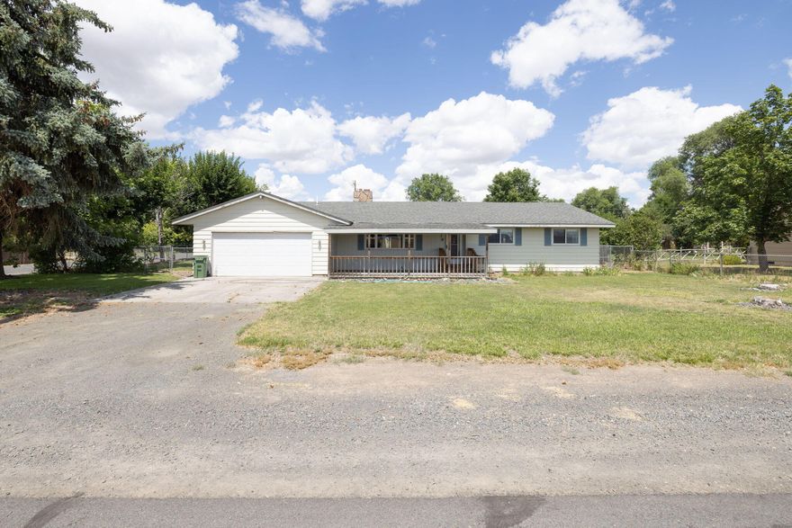 Excellent primary residence or second home for the Central Oregon outdoor enthusiast. Located in the peaceful, historic town of Metolius! Situated on a spacious double Jot totaling -32 acres, this well maintained 4-bedroom, 2.5-bath home offers comfort, convenience, and room to grow. This home features an attached double-car garage, fully fenced backyard with underground sprinklers, and mature landscaping. This property also includes a large 1,200 sq. ft. shop, built in 2009, complete with a loft, roll-up doors large enough to accommodate your RV or boat, and has a dedicated side entrance. Whether you need extra storage, or are looking to have a workshop, this space is the perfect complement to the home. Enjoy expansive views of the southern farm fields. The location of this property offers excellent access to all of Central Oregon's abundant outdoor activities and recreation.