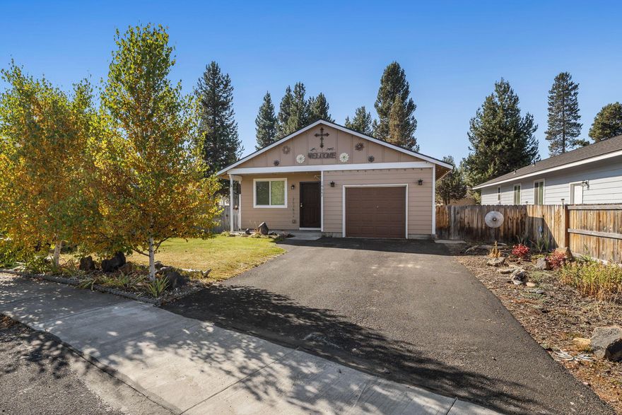 Rare opportunity!! Captivating home located in a low traffic cul-de-sac minutes from downtown. This 1,312 sq ft home sits on .21 acres and features an open concept in the living room and kitchen. Huge upside is the 4 bedrooms, 2 baths plus a bonus/theater room not included in the square footage. Additionally, the sizable lot has RV access parking in the back of the property. The yard boasts a private fully fenced area with a back deck for relaxing and barbecuing. Landscaping is low maintenance and includes lodgepole pines with a nice country living feel. The layout is very functional. Schedule your tour today!