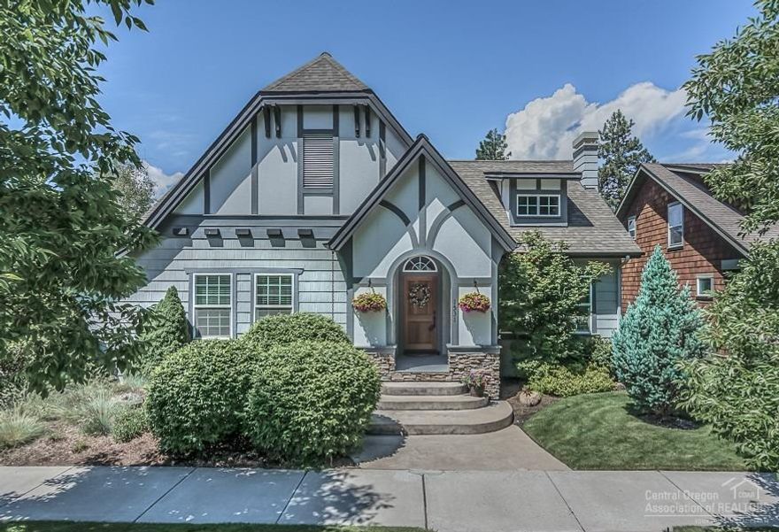 Live in the award winning NW Crossing neighborhood with gorgeous curb appeal in this delightful craftsman! Earth Advantage features! Soaring ceilings in great room with stacked stone fireplace and skylights throughout. Granite tiled kitchen w/new dishwasher and under cabinet lighting, crown molding, beautiful backsplashes, large closets & storage! Darling backyard w/covered deck, privacy, stamped concrete, fully fenced w/ gates. Corner lot style with extra parking.