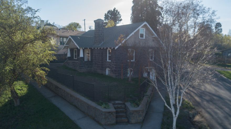 Cute and ready to move in.  3 Bedroom 2 bath home with extra parking plus garage and shop space below.  Covered front porch, coved ceilings, hardwood and new carpet, fully fenced.  Easy to show.  Come find out if this is the home you have been waiting for.