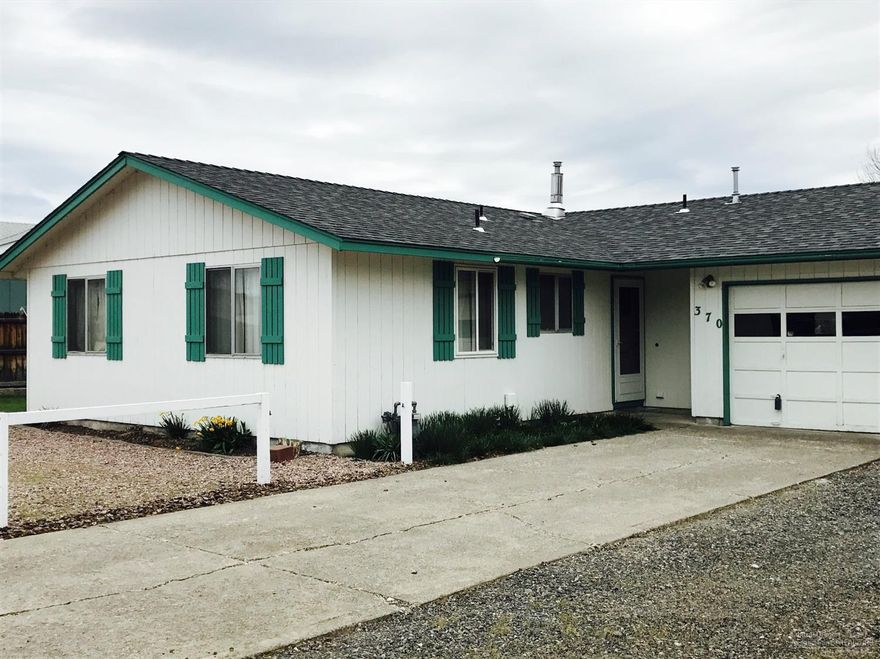 Attractive, well maintained 1156 sf, 3bd 1 ba located close to shopping, churches, and schools. Natural gas heat, water heater and kitchen range. Lvrm has large window plus a bay & sliders from dining area to back covered patio. Attached single garage, carport, shop & bonus/craft room. New roof and trim paint in 2016. Underground sprinklers, two storage units and low maintenance landscaping. Views of Prineville & surrounding rimrocks. Trustee is a licensed RE agent in Oregon