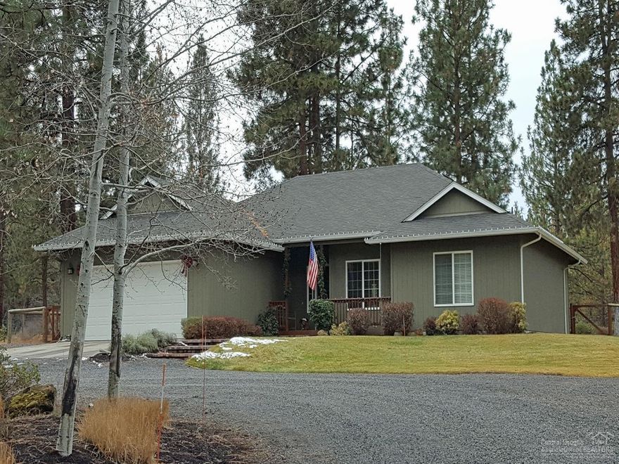 Enjoy country living close to town on this beautiful 4.80 acre pine treed parcel. This one owner, single level home offers a great room floor plan, large bedrooms with ceiling fans, and a double car garage. Entertain friends and family on the large paver patio and the fully fenced, beautifully landscaped back yard. There is a 10' x 10' building in the back that can be used as an office or extra storage. A small canal runs through the corner of the property. This home is located in a quiet area off of desirable Brookswood Boulevard, close to shopping, schools, biking and hiking trails.