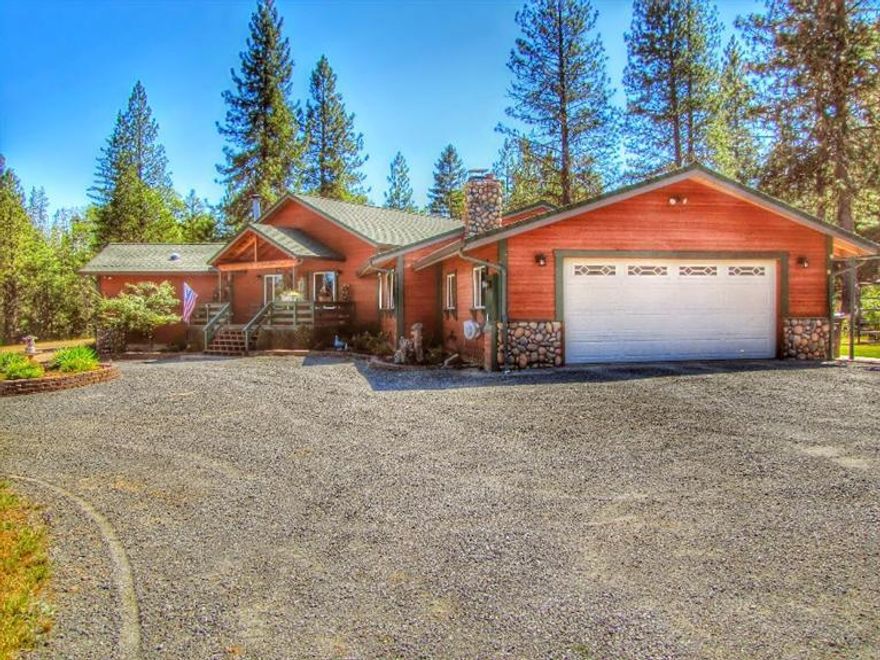 Must See custom home on 40+ acres! This gorgeous custom home with add. dwelling unit sits on 40 acres halfway between Medford and Grants Pass. With nearly 3300 square feet in the main home and 750 square feet in the guest home, there is enough room for weekend guests, mother in law, or regular rental income. The great room features open beam 15' ceilings, a chef's dream kitchen, a custom wood burning fireplace, and a huge dining area. The kitchen itself features stainless steel appliances, granite counters, custom cabinetry, and a huge gathering island. The secluded master suite features a lg 5 piece master bath with walk-in shower, jetted tub and 3 sided gas fireplace. The walk-in closet is a girls dream! The 2 guest bedrooms are ideally situated on this single level dream home. The detached guest home features a full bath, kitchen and living area. The 40 acres includes an 8 ac. meadow, merchantable timber, and total seclusion. This is a must see property in a must have location!