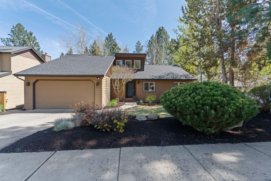 Welcome to this meticulously maintained home on a quiet cul-de-sac in one of Bend's coveted Northwest neighborhoods. This home is filled with natural light and features an open floor plan, including
kitchen, dining, and living area, highlighted by a floor-to-ceiling wood-burning fireplace with gas assist. The kitchen features brushed nickel fixtures, tiled counter tops, wood floors, stone backsplash, maple cabinets with pull-outs, pendant lighting, and stainless steel appliances. The finished basement is currently used as a home office and offers an abundance of storage space. Gather outside on the TimberTech deck that overlooks a beautifully expansive landscaped backyard. Enjoy easy access to shopping, dining, and local amenities. This home blends modern comfort, style, and convenience in an ideal location.