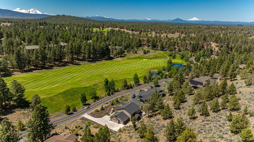 Located in the heart of Bend's west side and yet a world away, this Awbrey Glen home blends the tranquility of life along a lush fairway with the quiet dead end street. Here, you'll find a thoughtful floor plan with office, dining room & an open concept main living space that flows seamlessly to a covered back patio. Built around a center island, the kitchen includes 2  ovens, 5 burner gas cooktop, granite counters & butler's pantry with beverage fridge. The main level primary suite has dual walk-in closets, custom tile shower, soaking tub & heated bathroom floors. Attention to detail continues upstairs, with a large bonus room and 3 ensuite bedrooms. Take advantage of the iconic Deschutes River Trail, just two blocks away, or quiet moments on the private back patio. A covered front porch overlooks custom native landscaping with drought resistant plants & natural stone while a 2.5 car garage, bonus storage space & plentiful parking add the extra touches you can't do without!