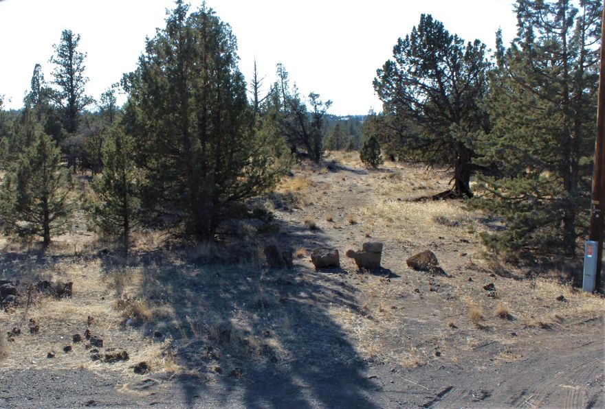Buildable 6.55 untouched acres at the end of a quiet cul-de-sac. Mt. Jefferson & 3 Sisters views. Electricity at property corner in cul-de-sac. Ready to make your own. All CRR amenities at your finger tips. Sellers are participating in a 1031 Exchange with no cost or effect to the Buyers.