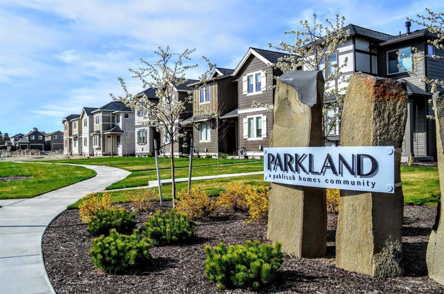 Located in SW Redmond lies this beautiful new, 1,471 sq.ft. Parkland townhome by award-winning Pahlisch Homes. With quartz countertops in the kitchen & baths, under-mount sinks, laminate wood flooring & a gas fireplace, it is evident that quality finishes are used throughout. This home features 3 beds, 2.5 baths & a 2 car garage. Photos of similar unit-specs vary. Floor Plan: Parkland 2-B-1471-2 (left unit). See for yourself why Pahlisch has won 150+ quality and value awards: Model Open Thurs-Sun 12-3.