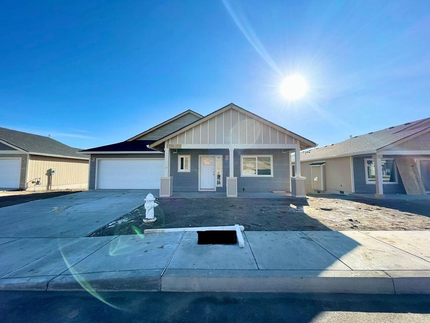 COMING SOON! Don't miss this new home in the Stoneridge Terrace Community. New neighborhood w/ miles of trails nearby! Spacious living both inside & out this single level Great Room plan. Open kitchen features plenty of cabinetry & prep space on the slab Quartz counters. Full height designer tiled back splash, breakfast bar w/ large island & SS appliances. Main living spaces offer luxury vinyl plank flooring, tons of natural light & plenty of room for gathering or entertaining. Spacious Owners Suite w/ walk in closet & dual vanities. Two additional spare bedrooms share a full bath. Laundry room w/ washer & dryer hookups is located conveniently near front bedroom. Double car garage, fully fenced yard, landscaped w/ sprinklers and complete w/ rain gutters. Pre-wired for A/C. Don't miss this one, move in before the New Year! Inquire about other floorplans in this neighborhood, still time to pick interior color packages on some! Photos of a similar plan, w/ different finishes.