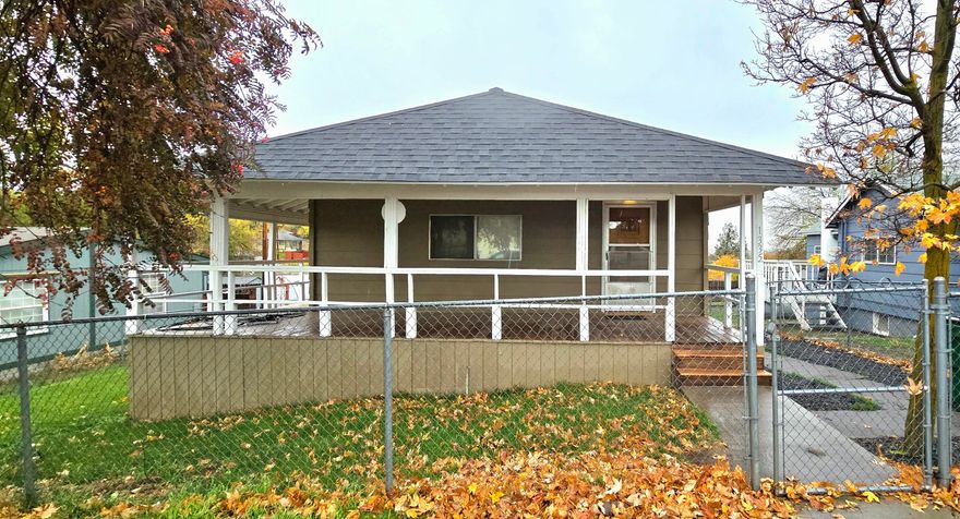 You will love this move in ready well-built home.
The home features a new roof, fresh paint inside\outside and the wrap-around porch looks like new.  The primary bedroom is huge and could easily be divided into 2.  The primary bedroom features new quality flooring.   Both bathrooms are a good size.  The garage\shop is approximately 800 sq. ft. and well insulated plus electric and water with alley access. The rear yard could accommodate 6 vehicles.  
Another great feature of this home is that it is nicely fenced.  You will enjoy a well done sunroom adjacent to the primary bedroom offering outstanding territorial views.
The location of this home is close to public transportation which gives you quick access to both the Sky Lakes hospital and Oregon  Institute of Technology.  You really need to tour this home to know how well done it is and how well it flows. Call lister for quick showing appointment.