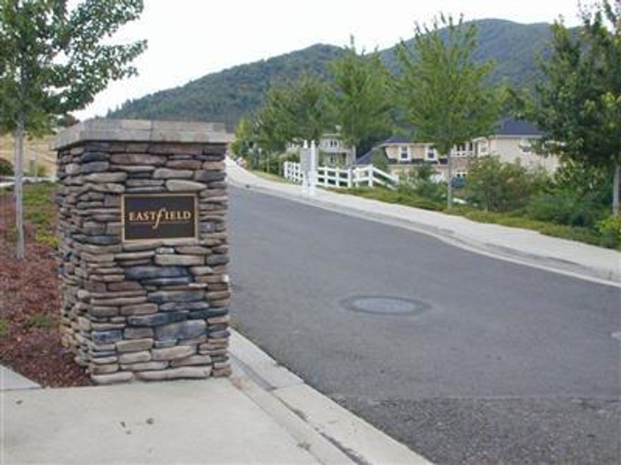 Rare 1.80 (+/-) acre estate homesite at the end of a private drive. This gentle sloping lot is located above Strawberry Meadows & offers seclusion & privacy. This lot is located in an area of very expensive custom homes & has a phenomenal view of the mountains & valley below. Price includes shared ownership in the tennis court built for the subdivision owners. Close to downtown Ashland, Lithia Park, walking & hiking trails. A very special property.