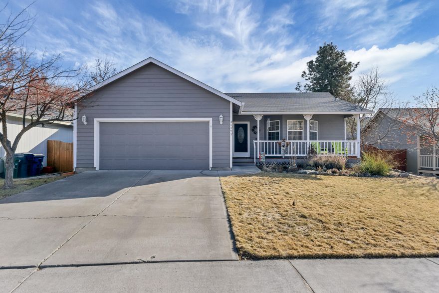 Light, bright, & charming 3 bedroom home, located near shopping, schools, parks & medical facilities in NE Bend is move-in ready. Vaulted ceiling in living area & natural light, make the home feel welcoming and warm. Brand new vinyl plank flooring and new carpet. This home has nice updates and has been well-cared for. Enjoy your morning coffee or tea by the bay window in the kitchen or enjoy views of the cascades and bird watching from your covered front porch. Home has a great layout and flows comfortably from one space to the next. French doors lead out to fenced backyard with a variety of trees and raised garden beds. Enjoy the southern exposure while relaxing on your back porch. Double car garage with ample storage. Welcome Home.