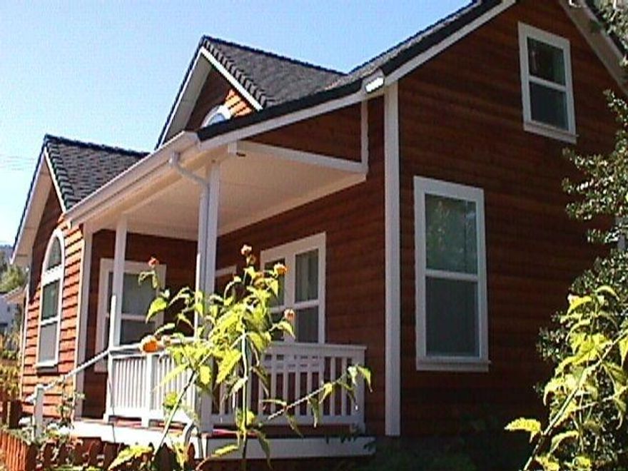 Year-round Clay Creek and pond with beautiful lawn areas for picnicking, relaxing or entertaining creates a serene setting right in town. One of the highly desirable Creekside Cottages, this attractive home offers a well-designed interior with loads of natural light, soaring ceilings, walls of windows & maple flooring with all main living on the main level. Upper level loft makes a great office, meditation space or 2nd bedroom. Additional unfinished attic space also on upper level. This is a delightful home with spacious kitchen featuring island and pantry. Lovely dining area opens to the living room. The open sense of space and light makes this home so comfortable and stylish. Covered deck overlooks the creek and pond, lush plantings, carport, bike and recycling closet, shared community tools.