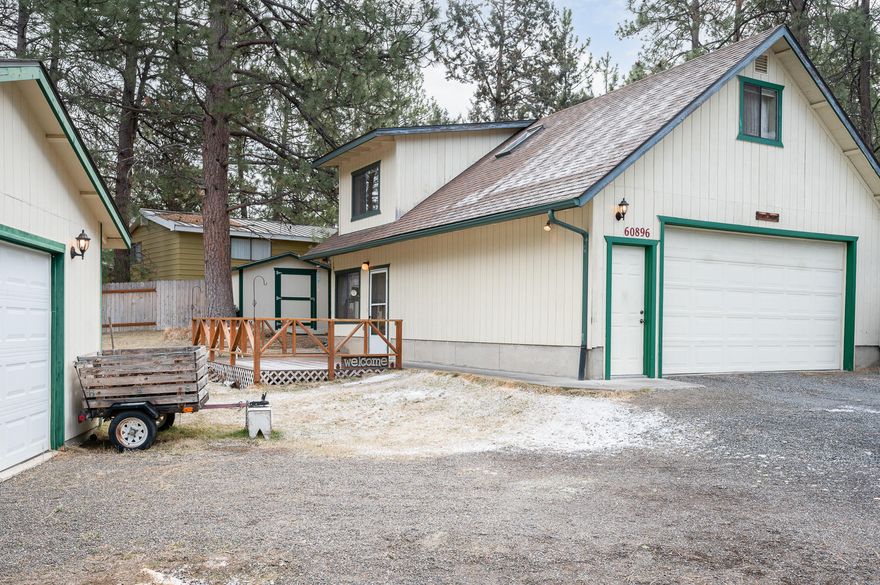 Cottage in the woods feel with this 1 bedroom, 2 bathroom, 2 storage sheds, and 1 storage room attached to the house with private entrance located on .26 Acres of land (11,326 sq ft). Oversized attached 552 sq ft garage with 10ft ceilings and utility sink plus 400 sq ft detached 20x20 garage. Newly built deck (2020) at front patio. Two story with bedroom (built in dressers) & full bathroom located upstairs, kitchen & full bathroom (laundry area in closet) on lower level, loft sitting room with skylight and wet bar on upper level. Connected to public sewer and Avion water. A lot of built in storage throughout home for cottage living, and ample storage with sheds and garages. Plenty of room for an RV, boat, and trailer. Ponderosa Pine trees viewed throughout the property. Baseboard heating zoned. Roof replaced and approximately 12 years old.