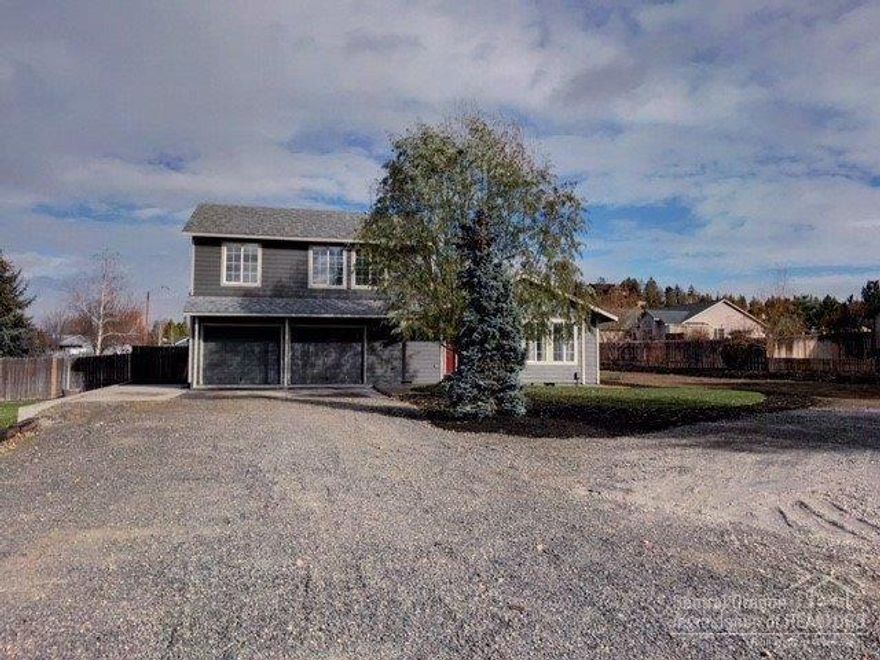 Private setting on almost 1/2 acre. Move in Ready! Great Neighborhood , ideal open floor plan with vaulted ceiling, large kitchen, 1668 sqft 3 bed/2bath. The master bedroom has a large closet and spacious bath and has a private deck. New paint inside and out, new flooring throughout, granite counter-tops in kitchen and new landscaping. Plenty of room for your trailer or toys with a double car garage.