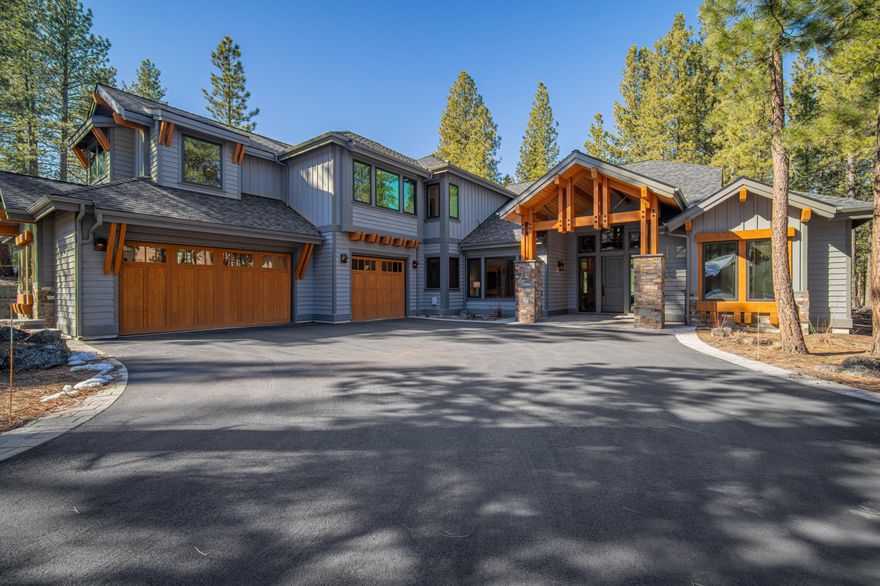 This exquisite, lightly lived home, w/ 4 bedrooms & 4.5 bathrooms, 2 King-suites on the main. Upstairs a Queen ensuite & King suite (room for bunks). Office/Media room on the main level & an upstairs Bonus Room w/ wet bar. Enjoy luxurious upgrades such as a 3-car garage w/ extra depth, a beautiful paver bordered driveway & an outdoor spigot offering both H&C water. Inside, discover engineered Hickory Hardwood Flooring, beamed ceilings in the GR & SONOS surround sound. Indulge in top-of-the-line window coverings, knotty Alder trim & cabinets & exquisite fireplaces w/ multi-functional features. Love the Butler's Pantry w/ prep sink & w/in Pantry. Extensive built-ins in the LR, Primary suite & walk-in closet. Additional features include ice melt cables, a built-in Gas BBQ, Electric Radiant Patio Heater, recessed Hot Tub w/ lights & fountains. This home is the epitome of luxury living in Caldera Springs, combining elegance w/ thoughtful functionality for your utmost comfort & enjoyment.