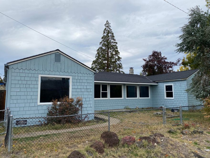 $5,000.00 credit at closing towards buyers closing costs! This will help with any upgrades buyer may want to do after closing. This a a lot of house for the money, 3 bedroom 2 bath home on a large fenced lot, close to Fitchner Manwaring Park, buses and amenities.  This home also has a new roof . There is a shop in the back, that is usable. Plenty of parking for RV or other cars. As per the city, this parcel can accommodate another unit. Buyers to do their own due diligence. Seller is  agent and owner.