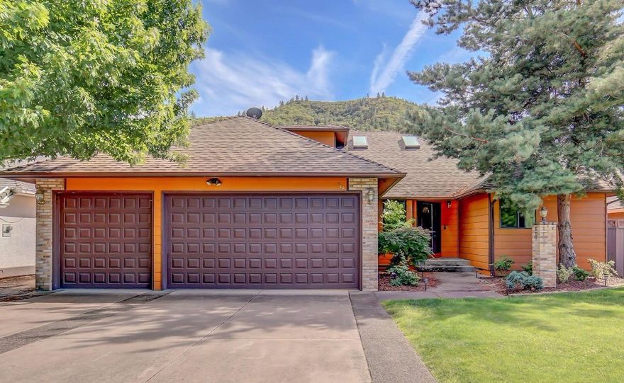 Enjoy beautiful river front living in this 2440 sq foot home in Gold Hill. This 3 bedroom, 2 bathroom home has many amenities such as: a spacious kitchen, beautiful wood floors, gas fireplace and vaulted ceilings. The master suite has so much to love! In the large bedroom there is a walk-in closet and you will enjoy stunning views of the Rogue River from the bay window. The master bathroom includes generous storage, a large vanity plus a double sink, and a jetted tub. Outside you will enjoy a spacious deck overlooking the river, private river access, and a boat shelter with steel tracked boat ramp. Contact us today to see this beautiful home!