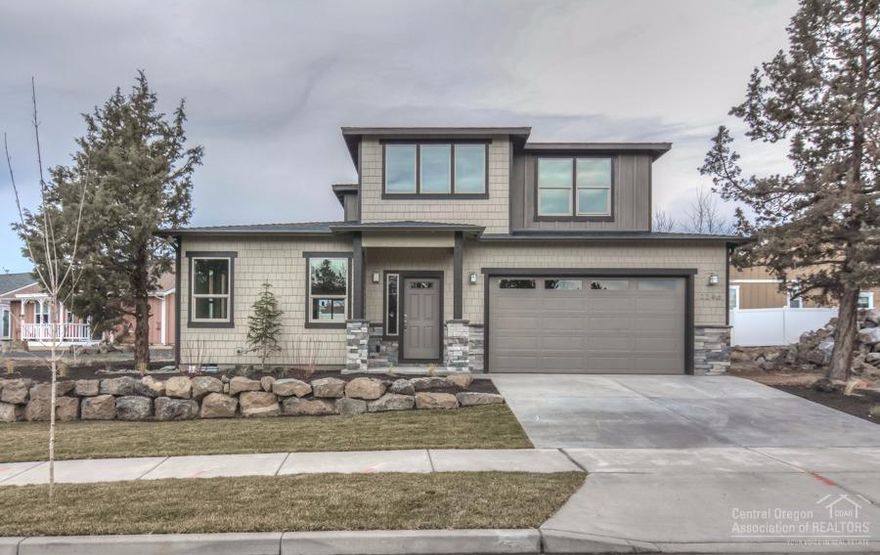 You will love this new construction home in NE Bend close to medical, restaurants, and shopping. Gourmet kitchen with quartz countertops, stainless appliances, and gas fireplace with rock surround in great room. Main level master suite with walk in tile shower and generous closet, and two bedrooms and an open bonus room upstairs. Pictures are of a similar floor plan.