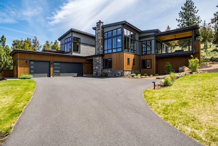 VIEW VIEW VIEW This extraordinary 3 bed, modern contemporary home on Awbrey Butte  built in 2019 and is the pinnacle of Bend living  Large gourmet kitchen awaits adorned with high-end appliances, perfect for culinary enthusiasts and entertaining guests  must-have modern walk-in pantry Enjoy meals in the dining room or bask in the beauty of the kitchen/great room, featuring floor-to-ceiling windows framing those majestic mountain views.
 
With high ceilings throughout, this residence exudes grandeur and sophistication. The Primary bedroom offers a haven of tranquility, complete with an en suite bathroom featuring dual sinks, a walk-in shower, and a large walk-in closet. A guest bedroom with an en suite bath and a nice-sized third bedroom provide ample accommodations for family and visitors The large 3-car garage w/storage area ensures plenty of space for vehicles and storage Step onto the expansive covered deck, featuring a gas fireplace, and those breathtaking views views views!